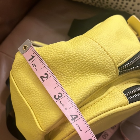 STEVE MADDEN logo mini tassel backpack in pastel yellow - Picture 11 of 11